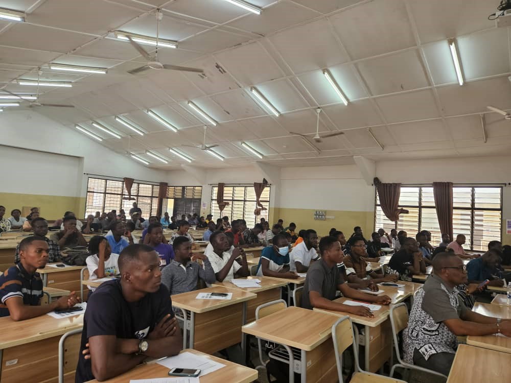 Students at the University of Ghana listen intently to presentations begin made by the AgriConnect team on the programme, its benefits to them, as well as the content that would be covered in the supplemental courses. This was held prior to the delivery of the laptops to students. 
