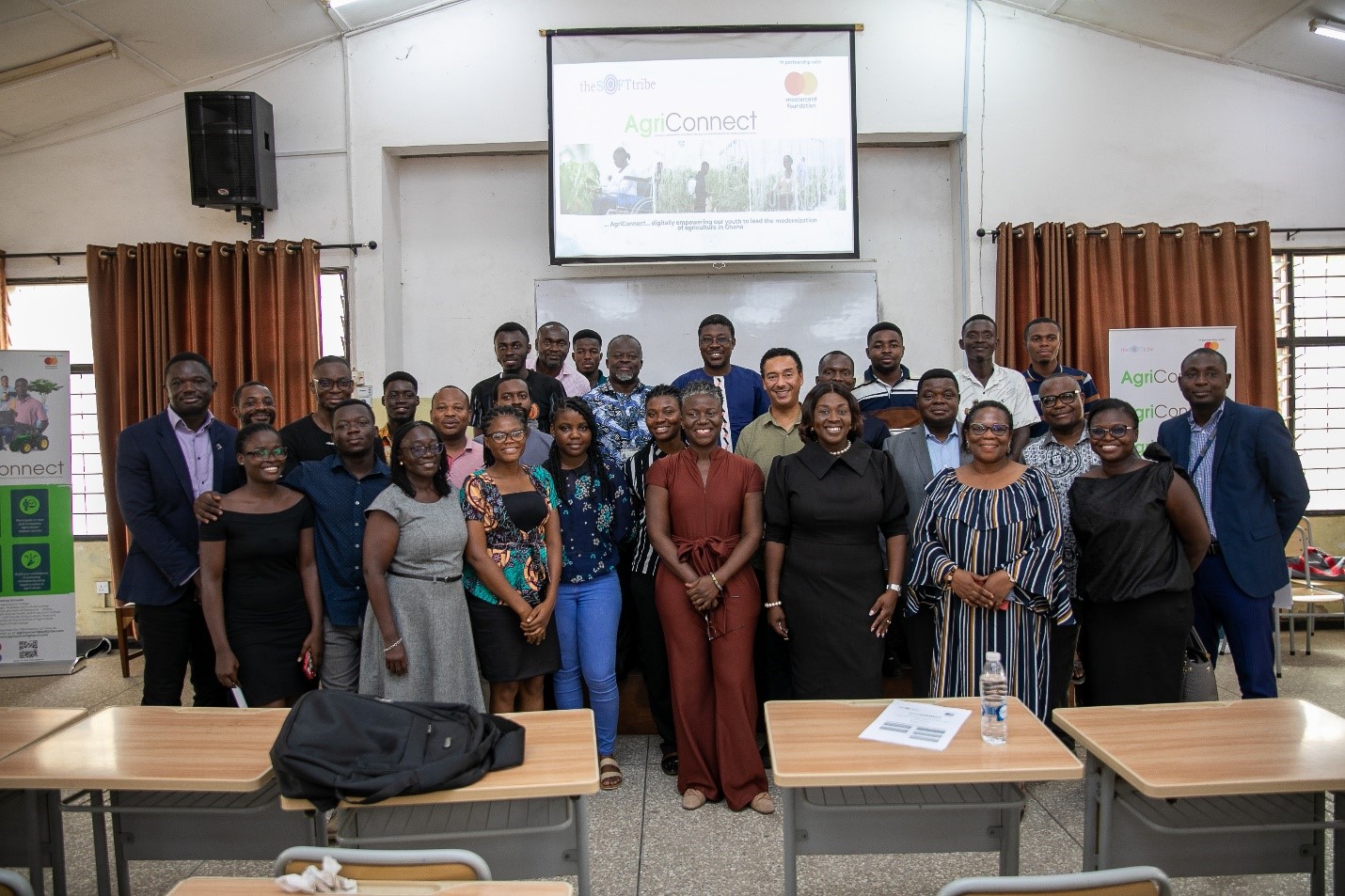 Members of the AgriConnect Team share lens time with faculty and students at the University of Ghana. The University of Ghana was the first stop on the roadshow to distribute laptops and connectivity to students as well as to sensitize them to the overall benefits of AgriConnect.